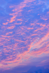 Wall Mural - Colorful with red, orange and blue dramatic sky on the clouds for abstract background. Romantic sunset background with beautiful blue, red and yellow clouds.