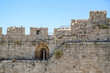 Ancient wall with arrowslit in the Old City of Jerusalem