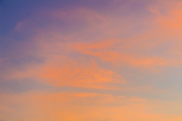 Wall Mural -  Red clouds on blue sky in twilight evening. Beautiful sunset sky with blue and red background. Dramatic colorful of dusk and dawn sky with blue sky and red clouds.