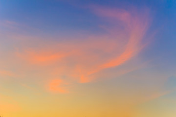 Wall Mural -  Red clouds on blue sky in twilight evening. Beautiful sunset sky with blue and red background. Dramatic colorful of dusk and dawn sky with blue sky and red clouds.