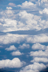 Wall Mural - White clouds in a blue sky