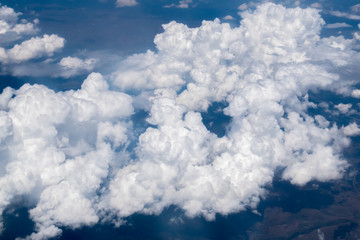 Wall Mural - White clouds in a blue sky