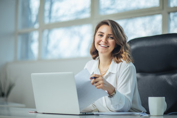 young woman in office working