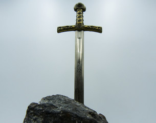 Wall Mural - Excalibur the mythical sword in the stone of king Arthur