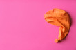 © New Africa - Orange deflated balloon on color background, top view with space for text