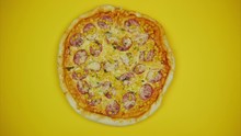 Pizza Spinning Appears And Leaves The Frame. Stop Motion