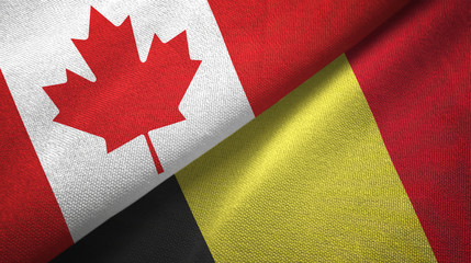 Canada and Belgium two flags textile cloth, fabric texture