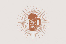 Hands Drawn Beer Mug With The Inscription Irish Luck In The Rays Of Light. Vintage Illustration On The Theme Of St. Patrick's Day. Monochrome Engraving Style.