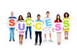 © Rawpixel.com - Group Of People Holding Sign Of Success