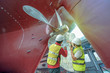 port controller, surveyor, inspector under inspect to recondition, repairing, patnting overhaul of the commercial ship, rudder and propeller fixed in properly assemble installation