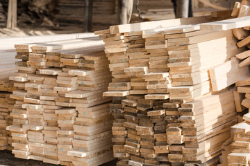 Wall Mural - Logs sawn on the boards. Sawing boards. A lot of lumber.