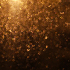 abstract blurred glowing lights of light gold shades