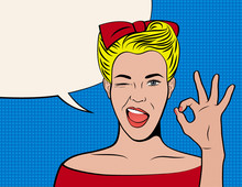 Vintage Advertising Poster Template. Beautiful Retro Girl Winks And Shows OK Gesture. Empty Text Box In The Form Of Speech Bubble. Vector Illustration In The Style Of Pop Art 50-60s. 