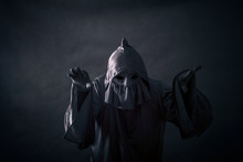 Scary Figure In Hooded Cloak 