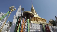 Wat Phra That Chae Haeng In Nan, Thailand, Showing The Golden Pagoda With Magnificent Construct Along Side.