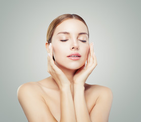pretty woman with closed eyes and young healthy skin. facial treatment, face lifting, anti aging and