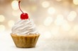 Cupcake with whipped cream and cherry