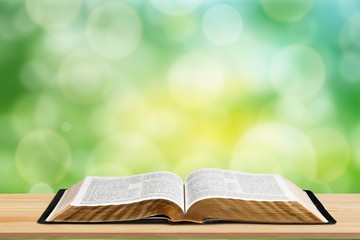 Wall Mural - open book on old wooden table