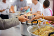 © kuarmungadd - Serving free food to the poor
