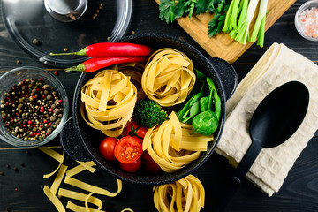 Poster - original Italian style pasta dinner on dark background. Italian cuisine