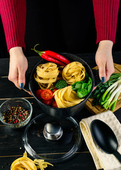 Poster - original Italian style pasta dinner on dark background. Italian cuisine