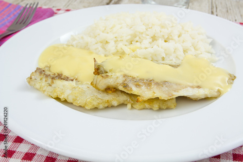 Filet De Poisson Sauce Beurre Blanc Et Riz Buy This Stock Photo