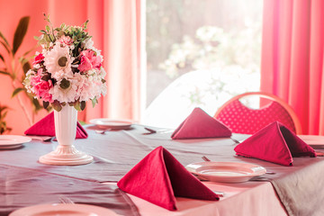 Sticker - Restaurant table with red napkins and flowers