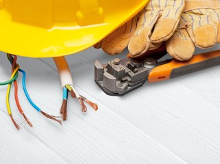 Wall Mural - Yellow hard hat and leather work gloves