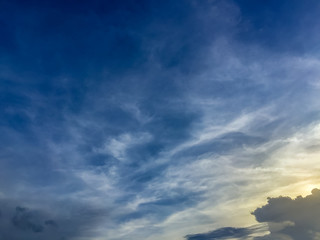 Wall Mural - Sunset with soft blue sky late afternoon background.  Early morning blue sky and bright clouds with good weather. Sunny day afternoon in early winter create a hazy background effect.