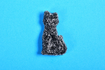 Poster - cat jelly candy on blue background