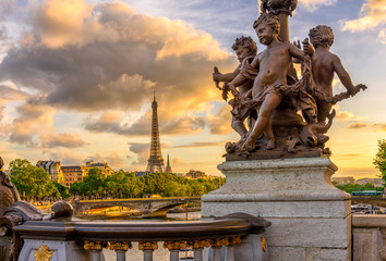 Fototapete - Sculpture on the bridge of Alexander III with the Eiffel Tower in the background at sunset in Paris, France