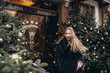 © Andreshkova Nastya - Young blondie girl outdoors. Christmas time. New year eve. Happy young cheerful girl