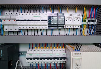 Image shows control cubicle. Electric device and circuit breakers inside power case