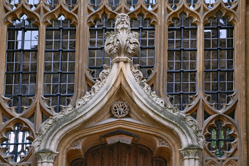 Poster - The Divinity School with its delicate stone framed windows dates from the 1400s, but the door was added by Christopher Wren in the 17th century.