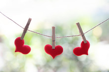 Red Hearts Hanging On A Rope