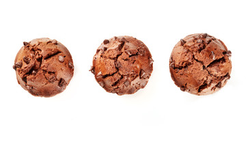 Sticker - An overhead photo of three chocolate muffins, shot from the top on a white background with a place for text