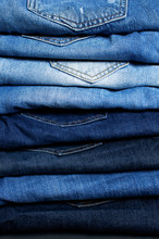 Set Of Different Blue Jeans. Detail Of Nice Blue Jeans. Jeans Texture Or Denim Background. Blue Denim Jeans Texture, Fabric Grunge Background. Beauty And Fashion, Clothing Concept