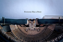 In The Old Typewriter Inserted A White Sheet Of Paper With The Inscription: Everyone Has A Story