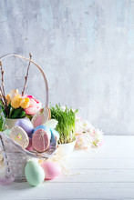 Easter Greeting Card With Glazed Cookies And Colorful Easter Eggs In Basket . With Copy Space