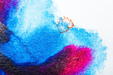 Poster - top view of blue and pink watercolor spills on white paper