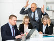© JackF - Group of sad frustrated employees receiving rebuke, suffering from bad attitude of shouting executive at work