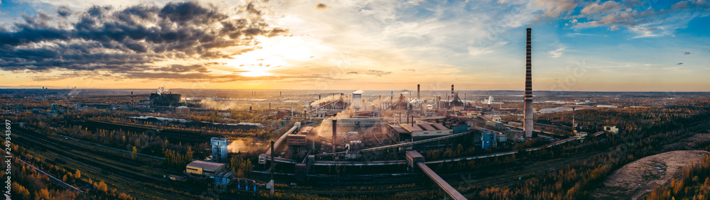 industrial landscape with heavy pollution produced by a large factory - obrazy, fototapety, plakaty 