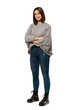 © luismolinero - A full-length shot of a Young woman with arms crossed and looking forward over isolated white background