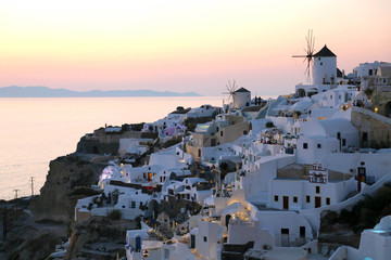  Fabulous picturesque village of Oia in Santorini island at sunset, Greece
