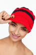 © Andriy Goncharenko - Portrait of an energetic beautiful woman with a red knitted hat on her head