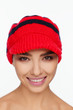 © Andriy Goncharenko - Portrait of an energetic beautiful woman with a red knitted hat on her head