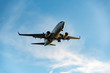 © RooM The Agency - Low angle view of an aircraft in the sky, British Columbia, Canada