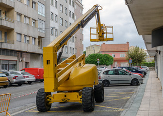 Wall Mural - construction lift on the street near the house