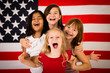 © IdeaBug, Inc. - Happy Girls by American Flag - Friendship, Unity, Freedom