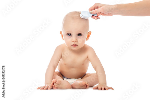 Mother And Baby Combing Hair Little Boy In Clean Dry Nappy